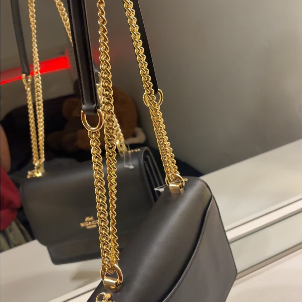 Elegant Black Leather Shoulder Bag with Gold Chain